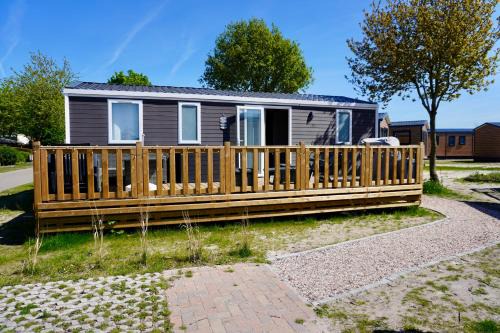 Kropswolde Chalet De Ski | Moderne chalet op het strand