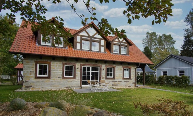 Wiek Appartement | moderne Ferienwohnung mit Kamin, Sauna, Terrasse - Ferienhaus Stenhuus FeWo 01