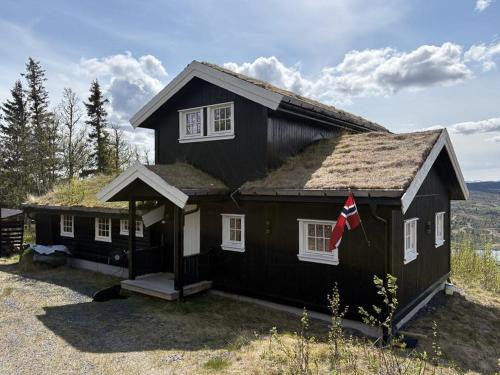 Vestre Slidre Maison | Modernized Log Cabin With Views Of The Mountains