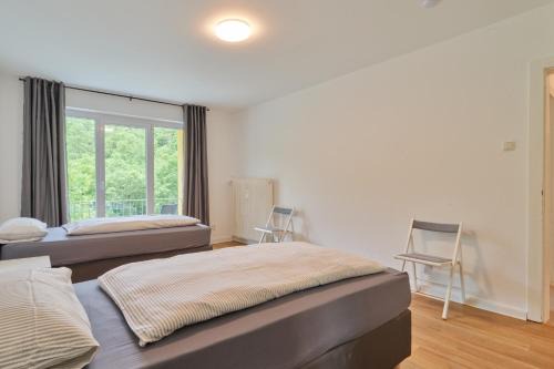 Ehrang-Quint Appartement | Monteurwohnungen in Trier - Parkplatz - Einzelbetten - Waschmaschine und Trockner