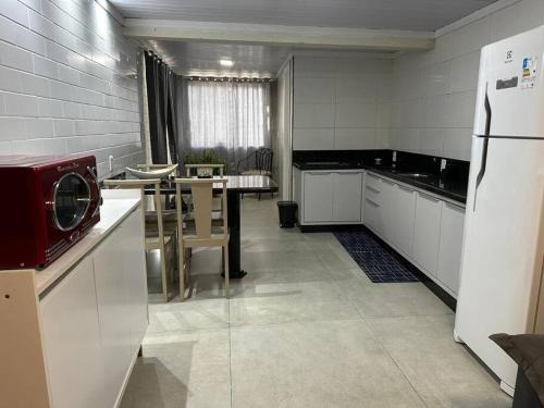 Carianos Appartement | Moradas Desterro, próximo ao aeroporto 01