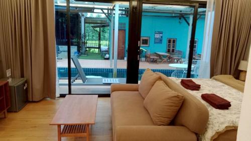 Kamphaeng Saen Maison | Morocco Blue cafe by Chilong River Farm Resort