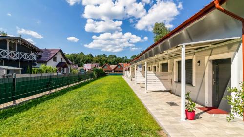 Sztutowo Cabine | Morskie Domki Apartamentowe by PIAMOLA