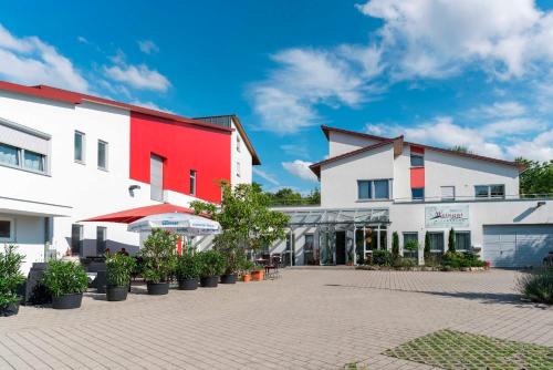 Nordheim Maison | Muellers Weingut und Weinstube im Auerberg