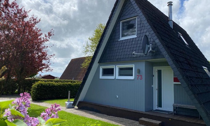 Carolinensiel Maison | Murmel 1 - Strandkorb, Wallbox, WLan, Kamin