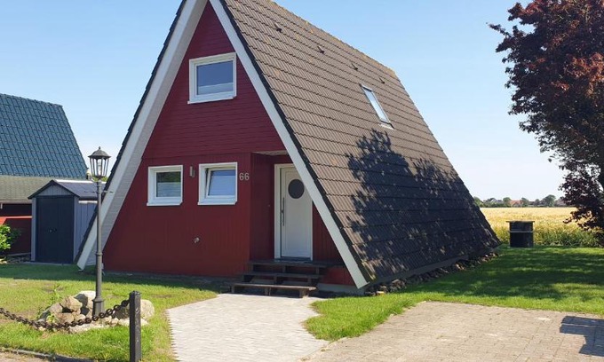 Carolinensiel Maison | Murmel 3 - Strandkorb, Wallbox, WLan, Kamin