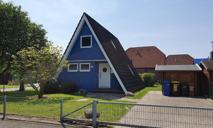 Carolinensiel Maison | Murmel 5 - Strandkorb, Wallbox, WLan, Kamin