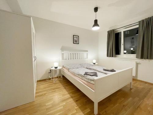 Simmering Appartement | MUZETA11 - Modern Town Apartment with Balcony