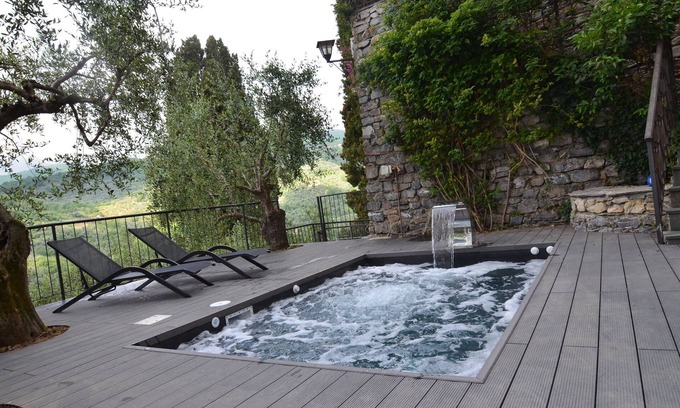 Praelo Maison | Natural stone house in panoramic position with pool and garden.