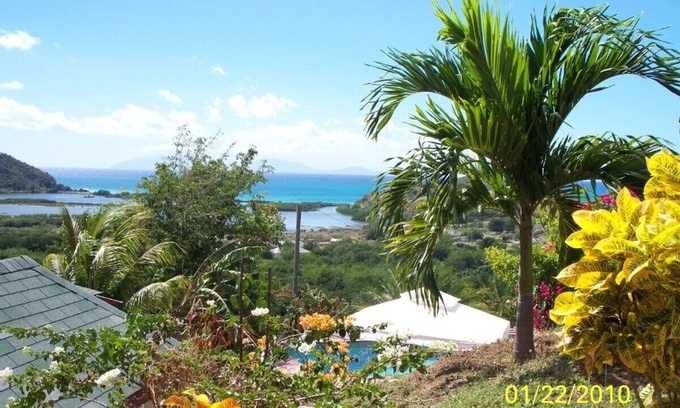 Valley Church Cottage | nestled in the hills overlooking the turquise seas of the caribbean