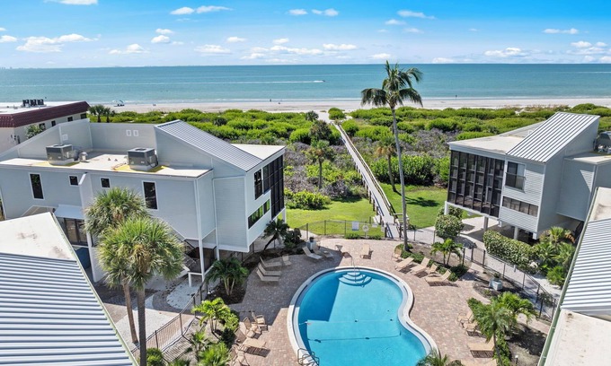 Sanibel Maison | New Cyprina Unit #2 – a fully renovated, Serena & Lily–inspired townhome on Sanibel’s sought-after East End. This luxury beach retreat seamlessly blends coastal elegance with modern comfort, offering breathtaking direct water views from every room.