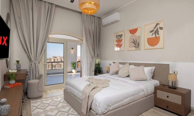 Marina El Alamein Appartement | New! Luxury Marina Resort Chalet: Panoramic Rixos & New Alamein Tower Views