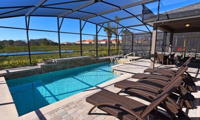 Loughman Villa | NEW! Spacious 5-Bedroom Resort Pool Home with Lake View