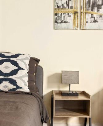 Newark Maison | Newark Gem Pearl 3BR, 2BA - Sleeps 10 - Walk to Prudential Center and Newark Penn Station, Near EWR and American Dream Mall, includes WiFi - Laundry - Backyard - Gym