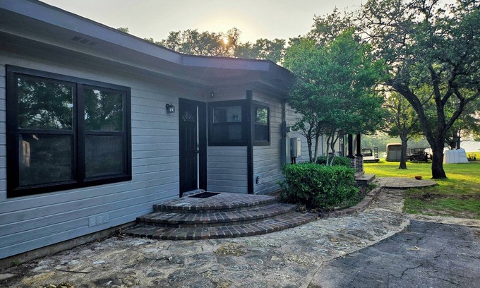 Whitney Maison | Newly Renovated 1.5 Acre Lake Front Home with Game Room and Direct Lake Access.