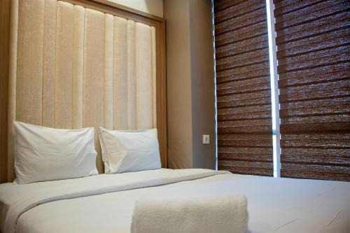 Menteng Appartement | Nice and Homey 2BR Apartment at Capitol Park Residence By Travelio