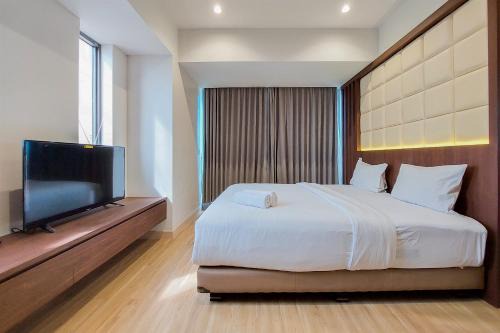 Bumi Serpong Damai Appartement | Nice and Spacious 2BR with Extra Room at Branz BSD City Apartment By Travelio