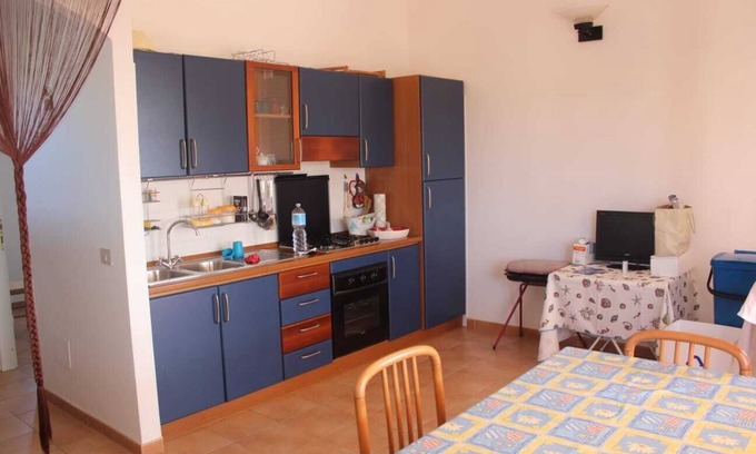 Stintino Appartement | Bel appartement avec véranda avec vue sur la mer