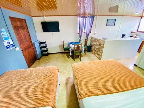 Barrio Dora Lit Et Petit-Déjeuner | Nomads Family Rooms, Fortuna Town