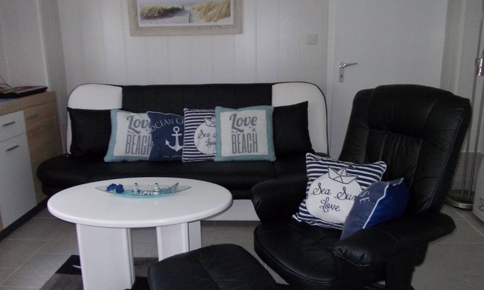 Nenndorf Appartement | Appartement non fumeur dans le jardin flair maritime avec chaise de plage vélo WiFi