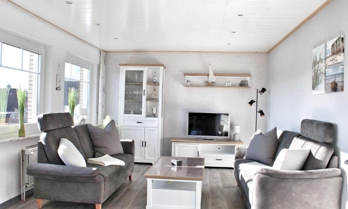 Ostermarsch Appartement | Nordsee Anker Unsere moderne 87 qm Ferienwohnung mit zwei Schlafzimmer in Norden Ortsteil Ostermarsch