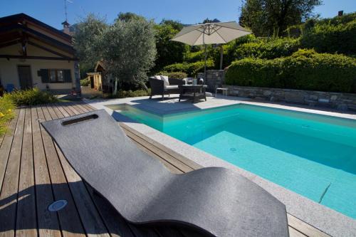 Castelveccana Appartement | Oasi di Castelveccana Apt Pool and View - Happy Rentals