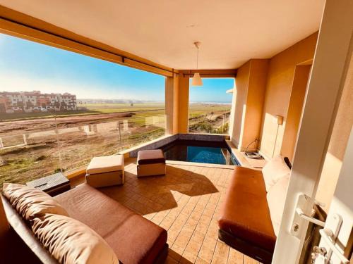Cherrat Appartement | Ocean Gem - Exclusive 2BR, Balcony Pool, Beach, Surf & Views
