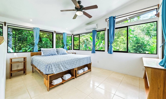 Pavones Maison | Charming, modern house in Pavones with AC, WiFi, ocean view from bedroom.