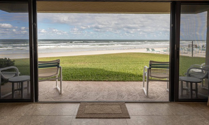 New Smyrna Beach Copropriété | Oceanfront Ground-Floor Retreat on No-Drive Beach | Peace & Comfort