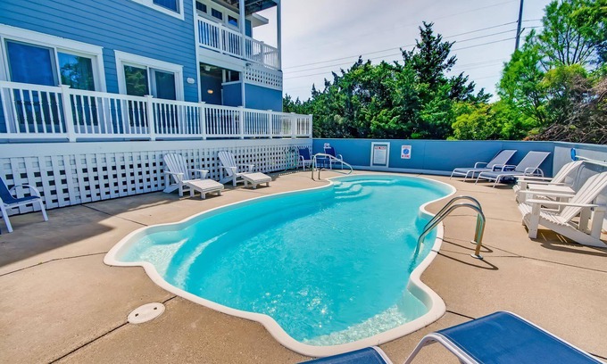 Ocean Isle Estates Maison | Équipements haut de gamme, vue sur la mer, piscine, bain à remous, salle de jeux, linge de maison, promenade sur la plage