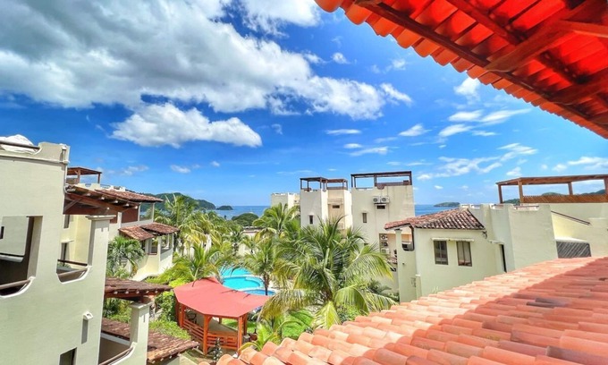 Coco Sunset Hills Copropriété | Oceanview Rooftop Patio - 5 Pools - Walk to Beach