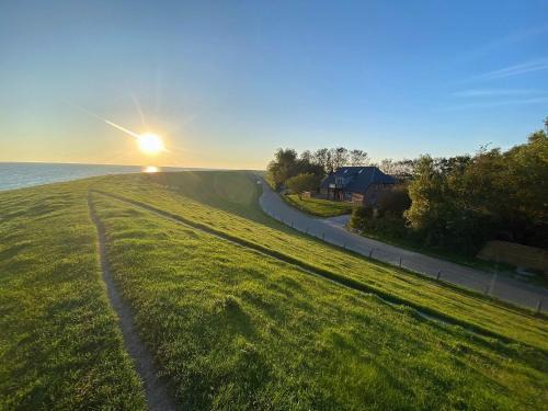 Nordstrand Appartement | Ockenswarft - Ferienwohnung Austernfischer