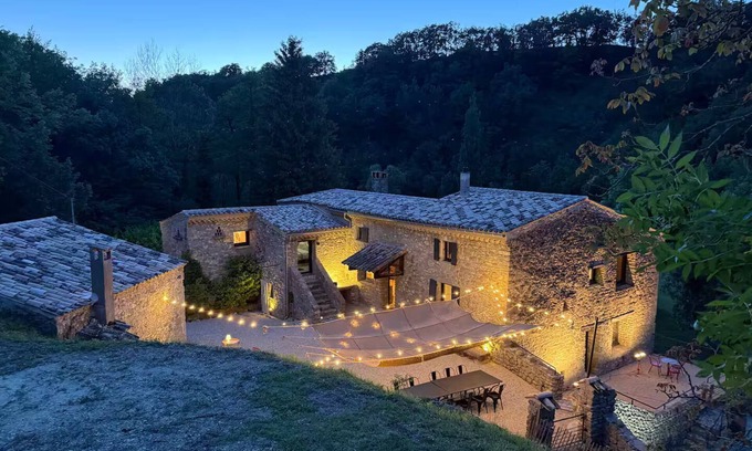 Truinas Maison | Old mill nestled in greenery in Drôme Provençale, hidden from view