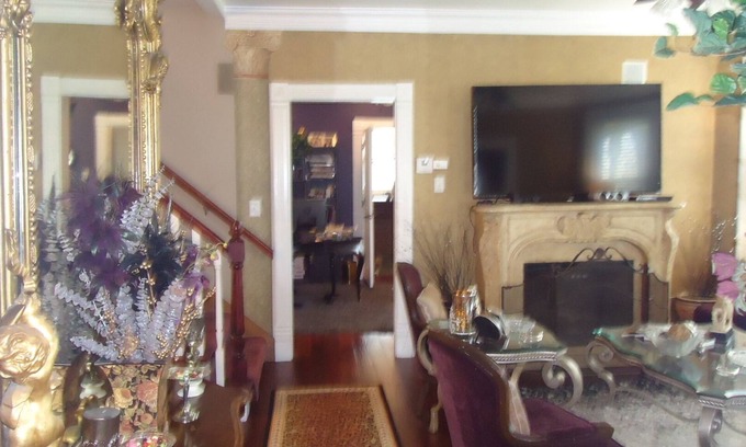 Green Bay Maison | Old world Charm, with view of Fox River wrap around front porch .