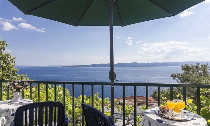 Brela Appartement | Appartement d'une chambre avec la terrasse et la vue sur le mer Brela, Makarska (A-11687-b)