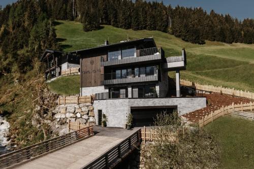 Huettschlag Chalet De Ski | ONKL XONNA Premium Alpin Chalets