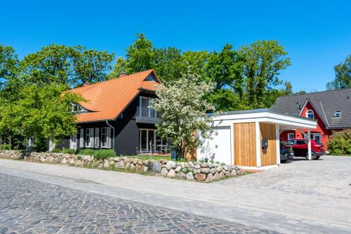 Born auf dem Darss Appartement | Ostseedomizil "Ankerbuk", Ferienhaus Silberreiher