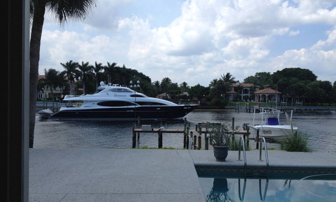 Juno Beach Appartement | IMPRESSIONNANT INTRACOASTAL AVEC QUAI DE BATEAU ET PISCINE CHAUFFÉE - Réponse immédiate aux demandes de renseignements