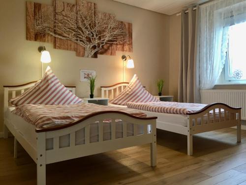 Hilbringen Appartement | Palminas Ferienwohnung OG