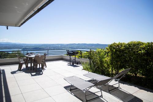 Massino Visconti Appartement | PANORAMA - Apartment with terrace overlooking the Lake