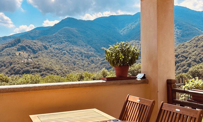 Sanfront Maison | Panoramic two-story dwelling with private garden, surrounded by green woods.
