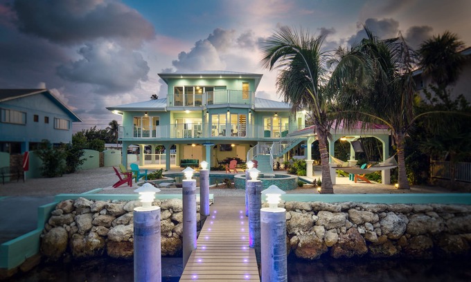 Marathon Maison | Paradise Bay - 4 chambres (avec 2 suites de maître) et 4 salles de bains - 10 personnes