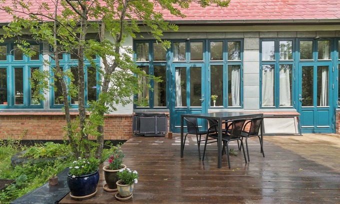 Østermarie Appartement | Part of a closed-down village school.