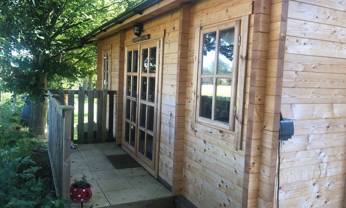Surlingham Cabine | Peaceful, cosy log cabin, Norfolk Broads village