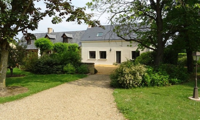 Saint-Gervais-en-Belin Cottage | Gîte familial avec jardin et vélos, proche Le Mans