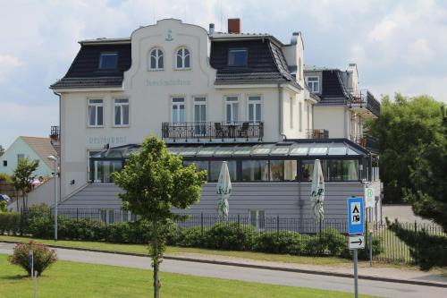 Borgerende Maison | Pension Strandschloss Arielle