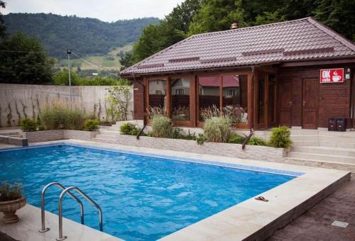 Baia de Aries Maison | Pensiunea Roua Muntelui