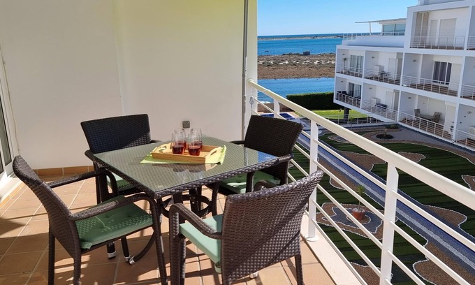 Fuseta Copropriété | Penthouse in Fuseta with private roof terrace and sea views