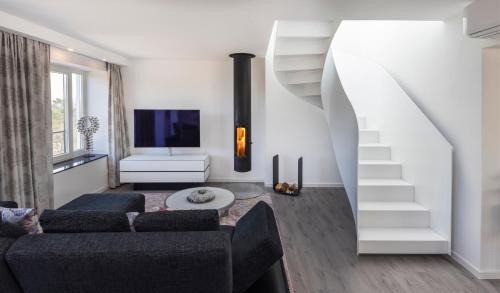 Prora Appartement | Penthouse mit Dachterrasse, Meerblick, Gasgrill, Klimaanlage, Kamin, Luxus-Design-Apartment, 2 Minuten zum Strand