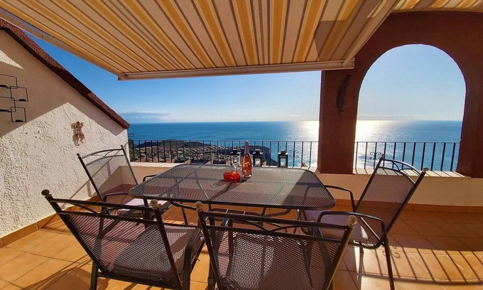 Cumbre del Sol Appartement | Appartement Casa Panorama avec vue sur la mer, piscine, climatisation, Wi-Fi et terrasse.